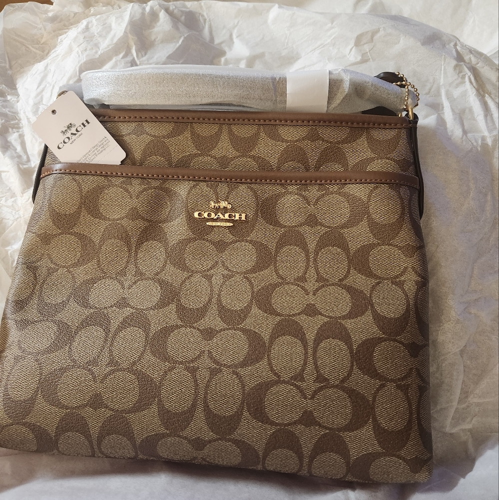 NWT Coach, 100% authentic, brown signature coated canvas